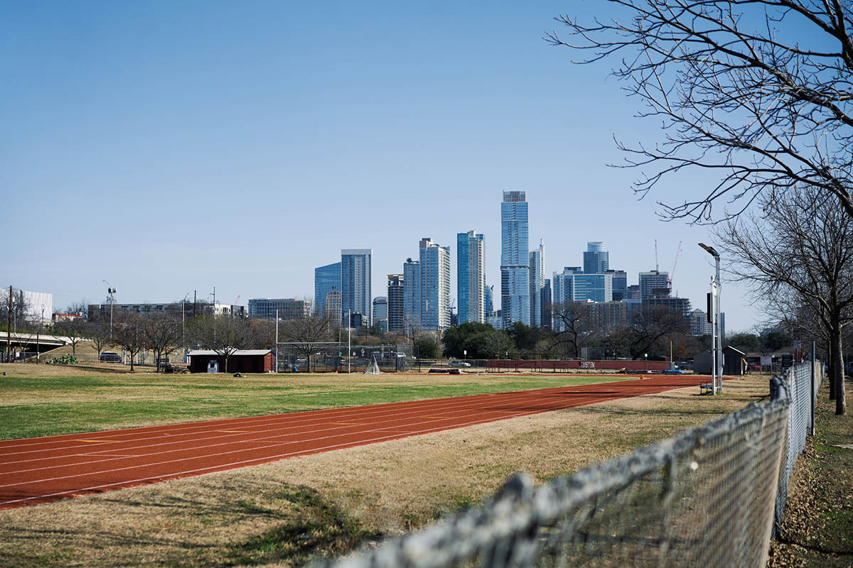 Austin cityscape with school running track in foreground